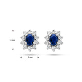 Oorknoppen met Saffier 0.50ct (2x 0.25ct) en Zirkonia Halo, 14 Karaat Witgoud - Formaat 7x8mm